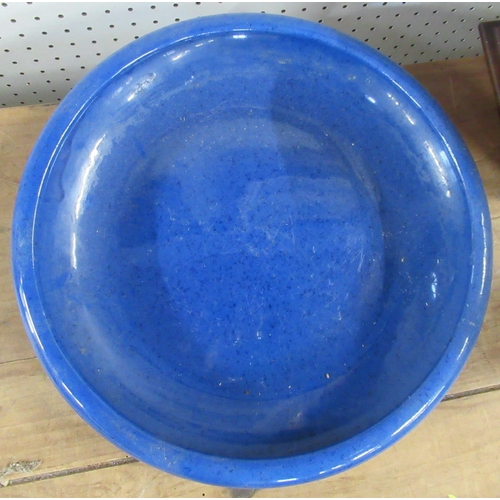 133 - An Oriental blue and white plate, af, diameter 9ins, together with a shallow blue bowl, diameter 13.... 