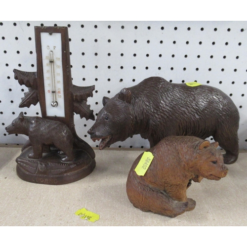 139 - Three Black Forest carved bears, one mounted with a thermometer