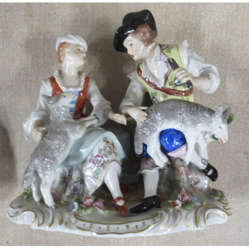 144 - A Sitzendorf porcelain figure group, of a couple with sheep, height 6ins