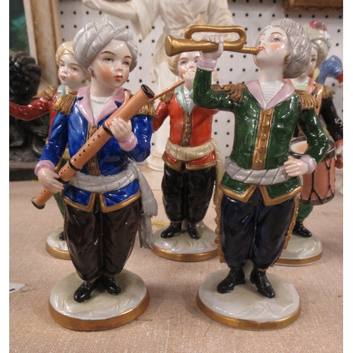 147 - A Sitzendorf porcelain six piece band, with figures plating musical instruments, height 6ins