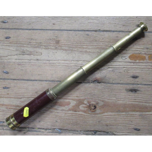 152 - T & H Doublet, A three drawer lacquered brass and mahogany telescope, length open 17ins