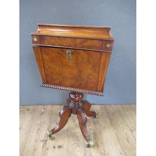 16 - A Regency mahogany cellarette / teaboy, the top opening to reveal compartments raised on turned colu... 