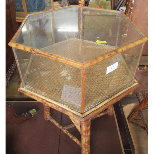 17 - A bamboo octagonal display table, together with another bamboo occasional table