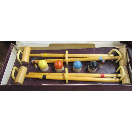 215 - A boxed Bussey's Table Croquet set, with four mallets, balls etc