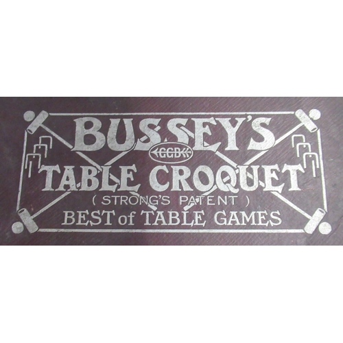 215 - A boxed Bussey's Table Croquet set, with four mallets, balls etc