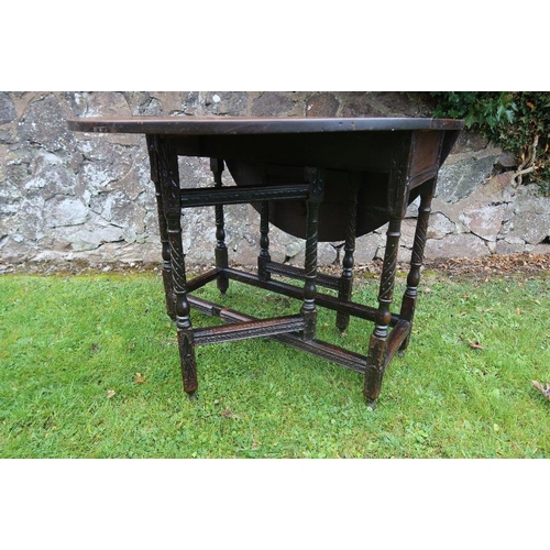 22 - A mahogany writing table, width 40ins, depth 18ins, height 30ins, together with 2 oak gate leg table... 