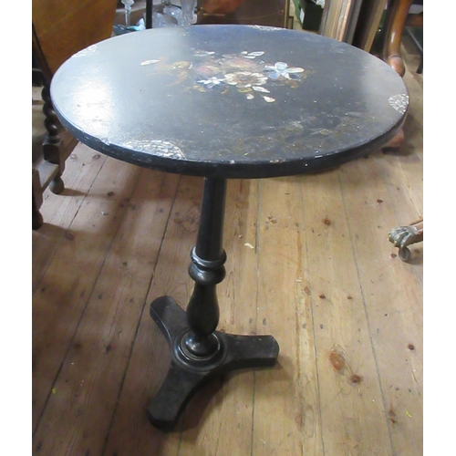 23 - A 19th century papier mache table, with mother of pearl and painted flower decoration, diameter 20in... 