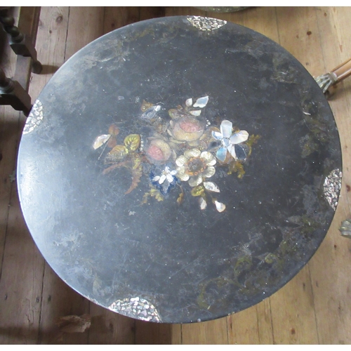 23 - A 19th century papier mache table, with mother of pearl and painted flower decoration, diameter 20in... 