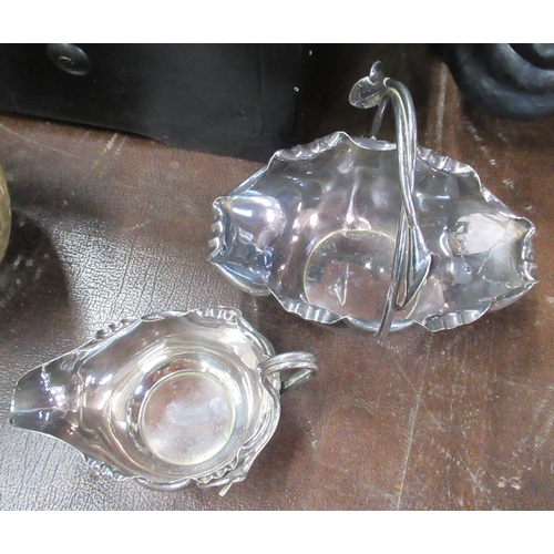 233 - A silver milk jug, and sugar bowl, with shaped edge and flower handles, weight 7oz