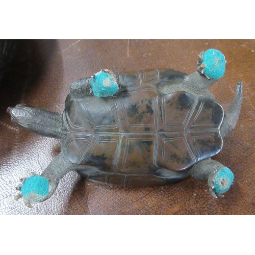 242 - A bronze model of a tortoise, tail af, length 7ins