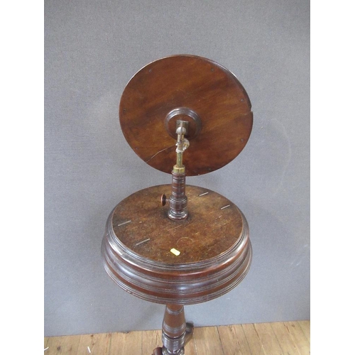 34 - A late Victorian/Edwardian  shaving stand, with adjustable mirror, raised on turned column, terminat... 