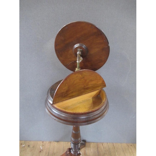 34 - A late Victorian/Edwardian  shaving stand, with adjustable mirror, raised on turned column, terminat... 