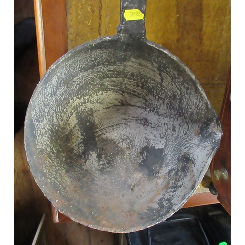 35 - A large steel casting ladle, length 43ins