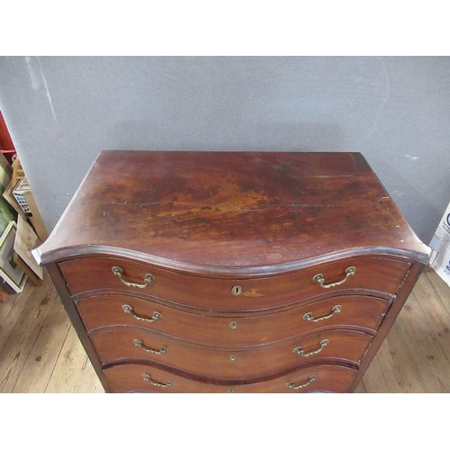 38 - A Georgian mahogany serpentine front chest of drawers, fitted four graduated  drawers , raised on br... 