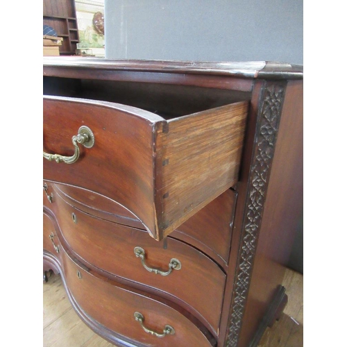 38 - A Georgian mahogany serpentine front chest of drawers, fitted four graduated  drawers , raised on br... 