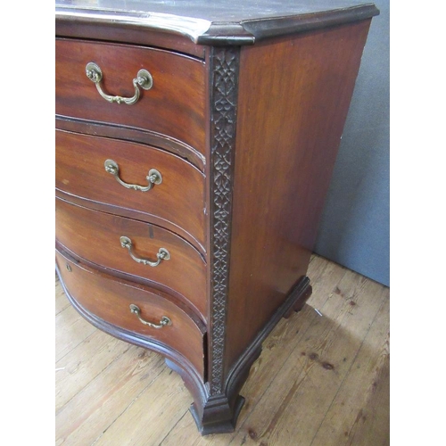 38 - A Georgian mahogany serpentine front chest of drawers, fitted four graduated  drawers , raised on br... 