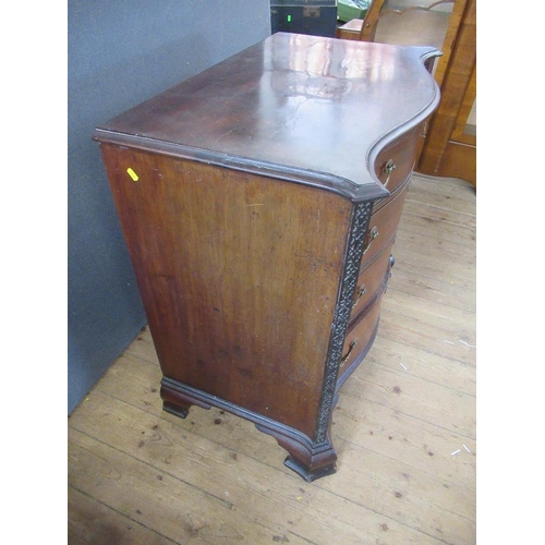 38 - A Georgian mahogany serpentine front chest of drawers, fitted four graduated  drawers , raised on br... 