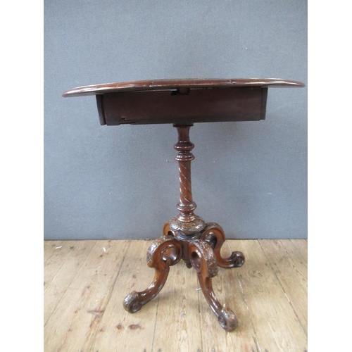 40 - A 19th century walnut games table raised on turned column, terminating in four outswept feet, width ... 