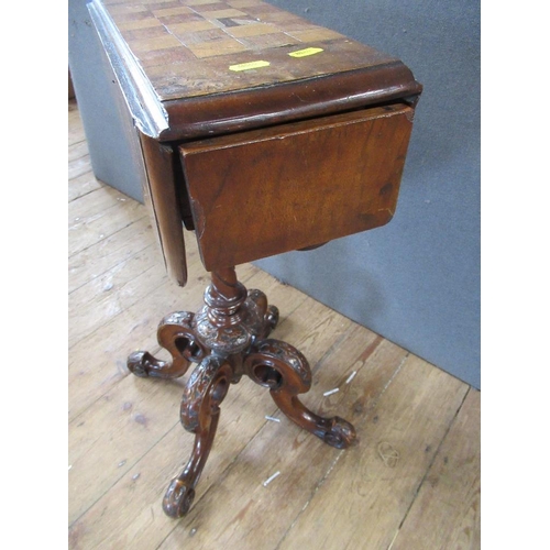 40 - A 19th century walnut games table raised on turned column, terminating in four outswept feet, width ... 