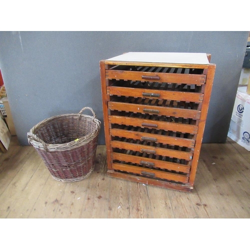 46 - A fruit rack, fitted eight drawers, width 28ins, height 35ins, depth 19ins, together with a basket