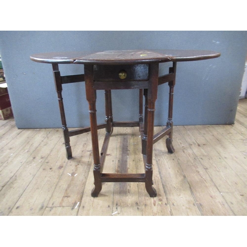 47 - An Antique oak gate leg table, width 38ins, height 28ins