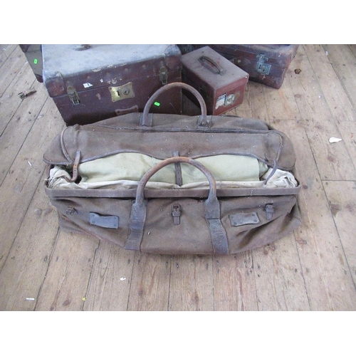 51 - A collection of vintage leather baggage, including, including trunks, suitcases ,holdalls etc, some ... 