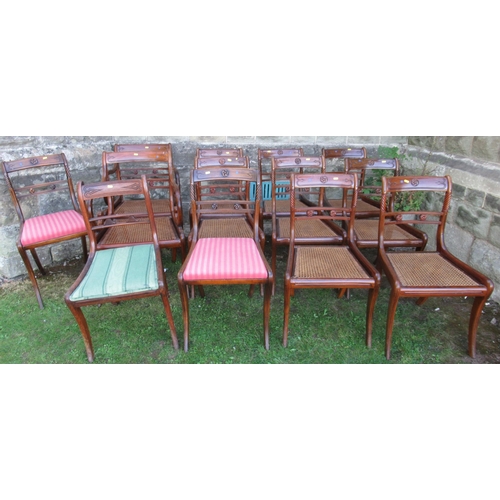 60 - A harlequin set of  13 (11 + 2) Regency mahogany dining chairs, with caned and upholstered seats