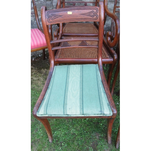 60 - A harlequin set of  13 (11 + 2) Regency mahogany dining chairs, with caned and upholstered seats