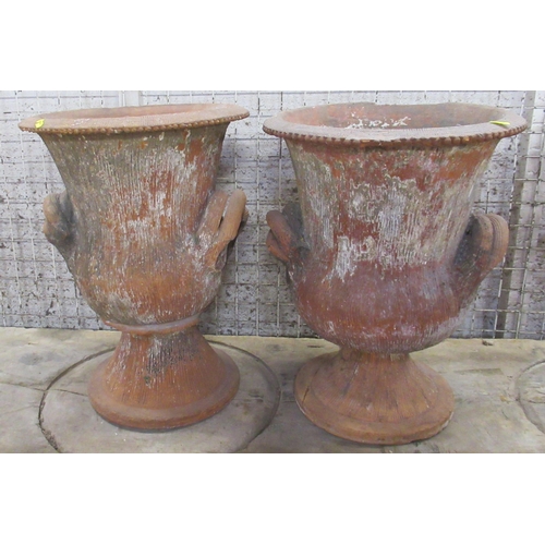 7 - A pair of terracotta campagna shaped garden urns, af, height 21.5ins