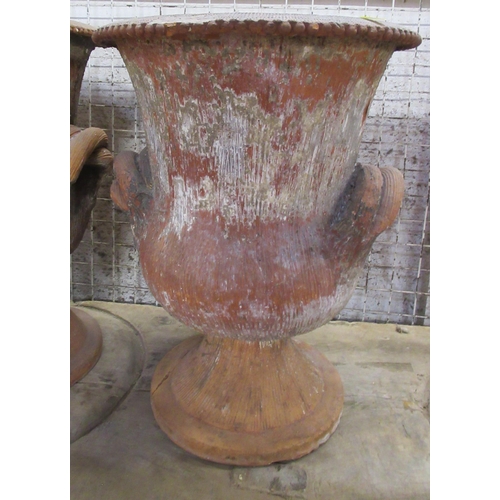 7 - A pair of terracotta campagna shaped garden urns, af, height 21.5ins