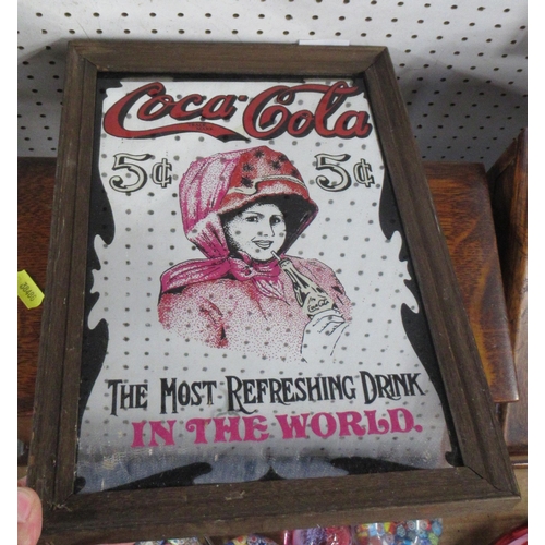 96 - A Coca-Cola mirror, 12ins x 7.5ins