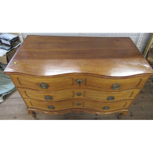 10 - An Antique double fronted serpentine continental commode chest, of three drawers, raised on short ca... 