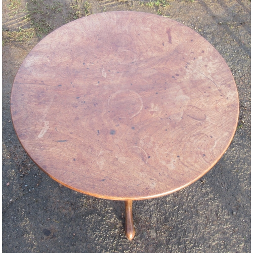 11 - A circular mahogany occasional table, raised on tripod base, width 27ins