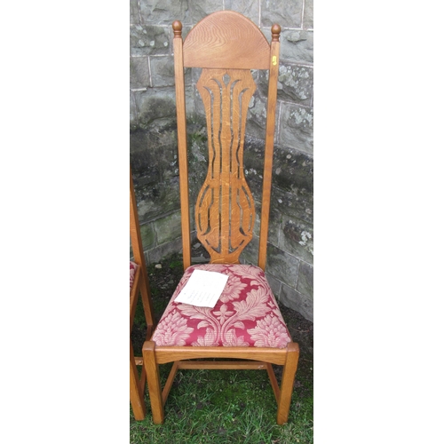 17 - A pair of tall oak special dining chairs, by Timothy Hawkins, Fine Furniture of Ledbury, with a broa... 