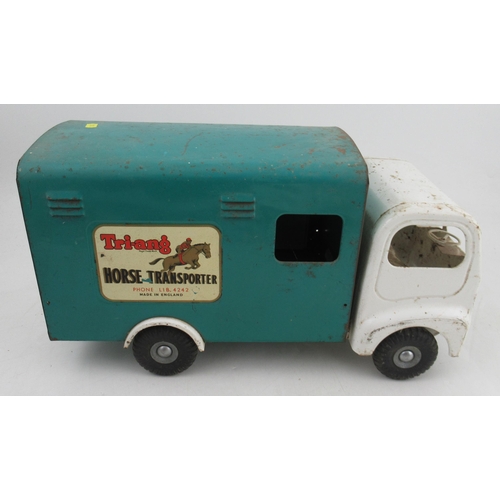 181 - A Tri-ang Horse Transporter, together with a Tri-ang milk float with milk bottles