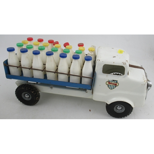 181 - A Tri-ang Horse Transporter, together with a Tri-ang milk float with milk bottles