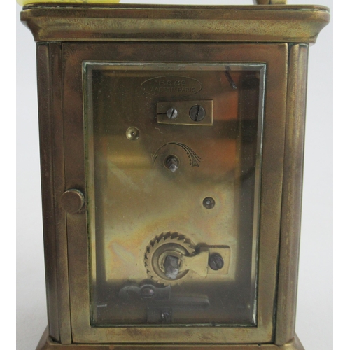 191 - A carriage clock, engraved R&Co Made in Paris, with travel case