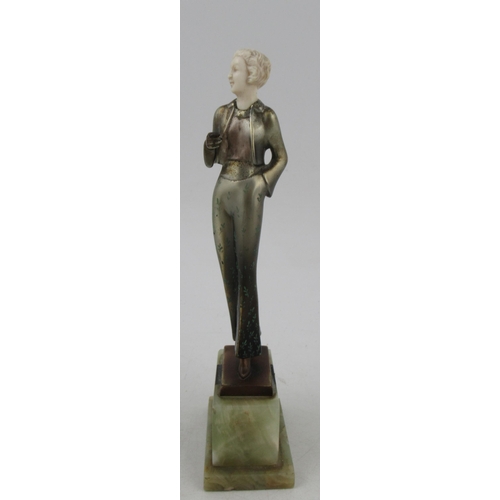 197 - Lorenzl, a patinated bronze and ivorine figure, of a stylish Art Deco woman, signed to bronze base, ... 