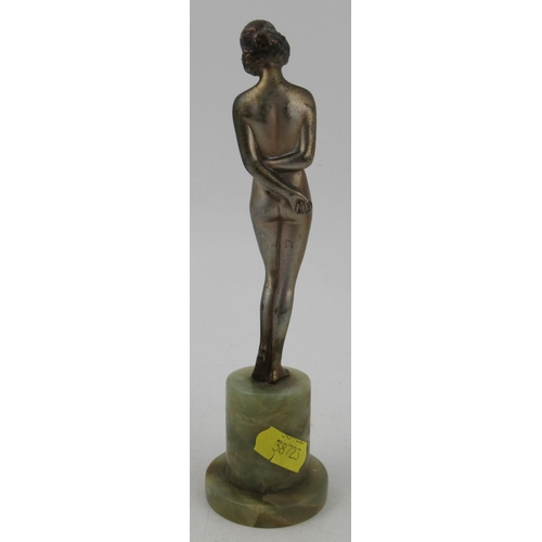 198 - Lorenzl, a patinated bronze figure, of a nude girl with arms crossed behind her back, height 7.5ins