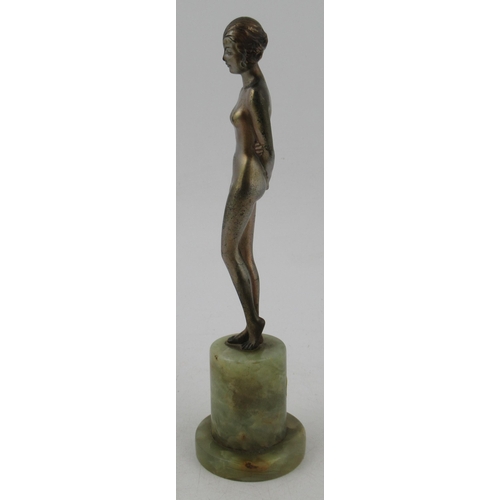 198 - Lorenzl, a patinated bronze figure, of a nude girl with arms crossed behind her back, height 7.5ins