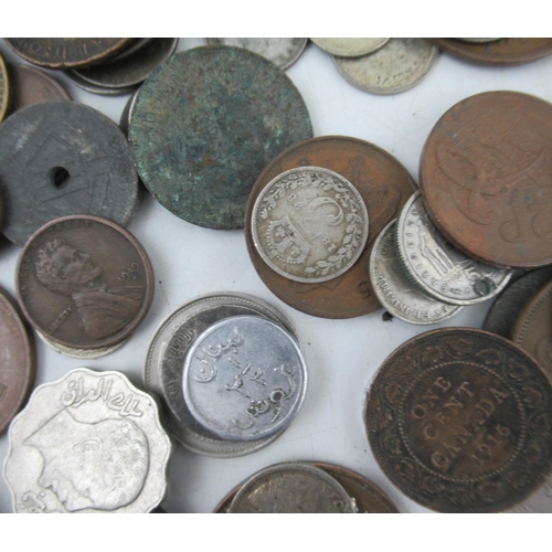 235 - A collection of coins and other items