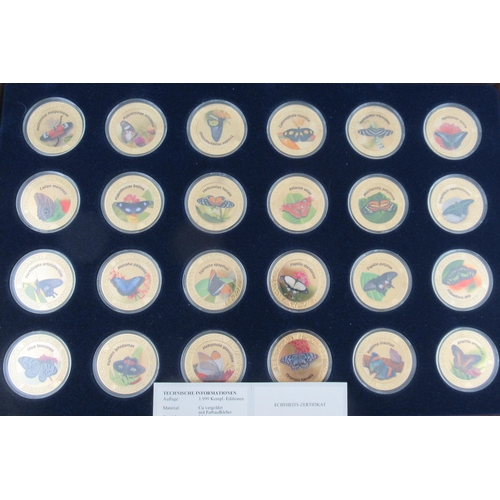 236 - Three cased enamel and gilt coin sets, together with other commemorative coins