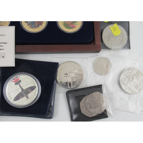 236 - Three cased enamel and gilt coin sets, together with other commemorative coins