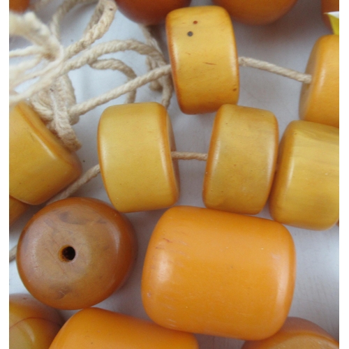 238 - A collection of assorted amber type beads