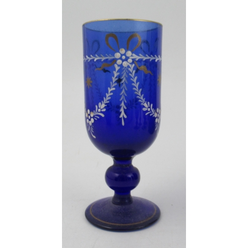 242 - A collection of Antique coloured glass, to include five Bristol blue glasses with white and gold dec... 