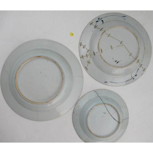 261 - An 18th century Chinese plate, decorated with bamboo and a fence, together with another plate decora... 