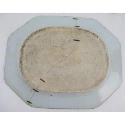 261 - An 18th century Chinese plate, decorated with bamboo and a fence, together with another plate decora... 