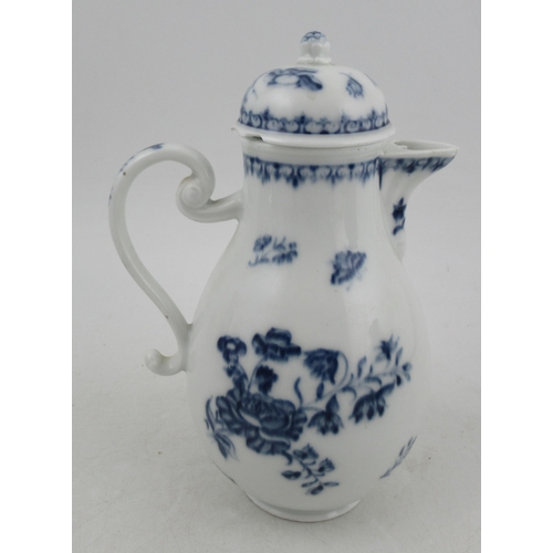 269 - A German porcelain covered hot water jug, decorated in under glazed blue with flowers and butterflie... 