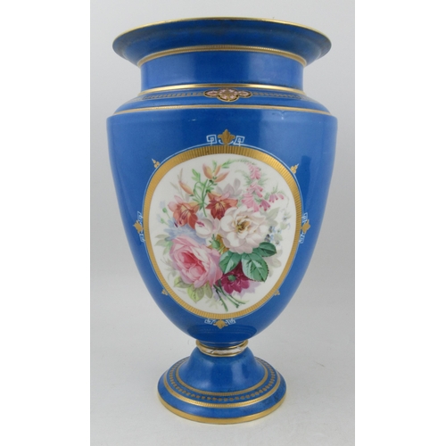 273 - A Continental porcelain pedestal vase, decorated with an oval panel of figures seated in a garden an... 