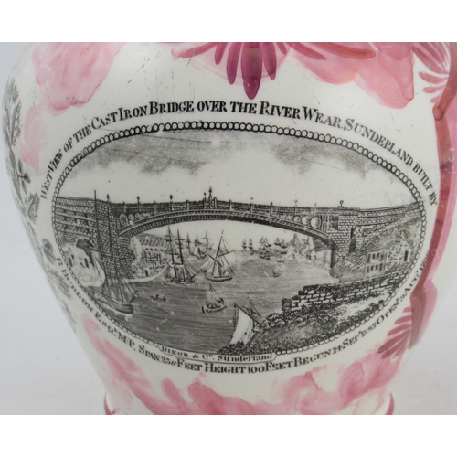 288 - A 19th century English porcelain luster jug, printed with a view of Ironbridge and text, height 7ins... 